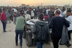 At least 21 Palestinians killed while heading to Gaza aid hub, hospital says