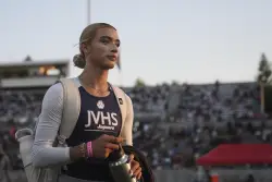 California track and field championship sees arrest and aerial banner amid transgender controversy